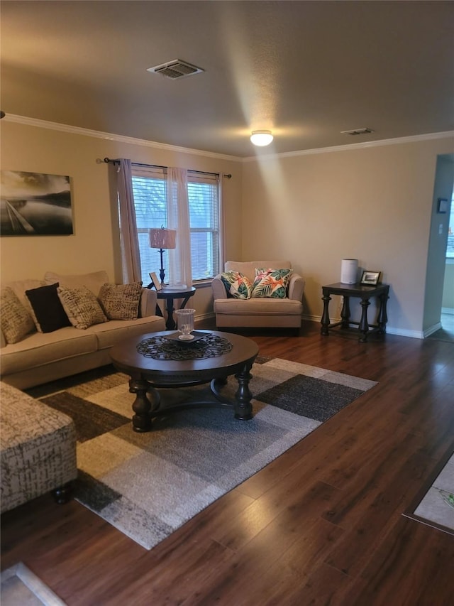 living room featuring ornamental molding and dark hardwood / wood-style floors