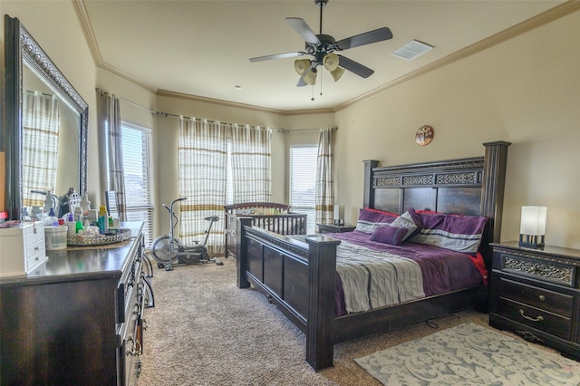 bedroom with ceiling fan, light colored carpet, and multiple windows