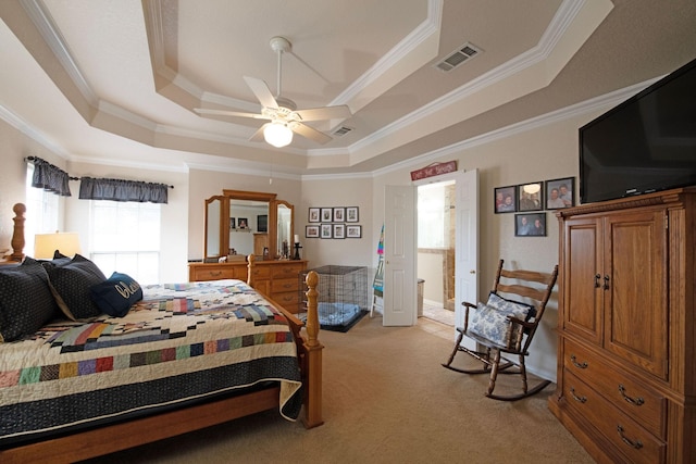 carpeted bedroom with crown molding, a raised ceiling, and ceiling fan