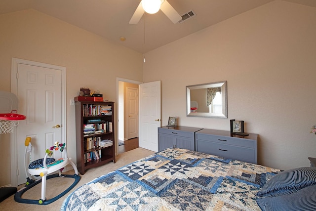 carpeted bedroom with lofted ceiling and ceiling fan