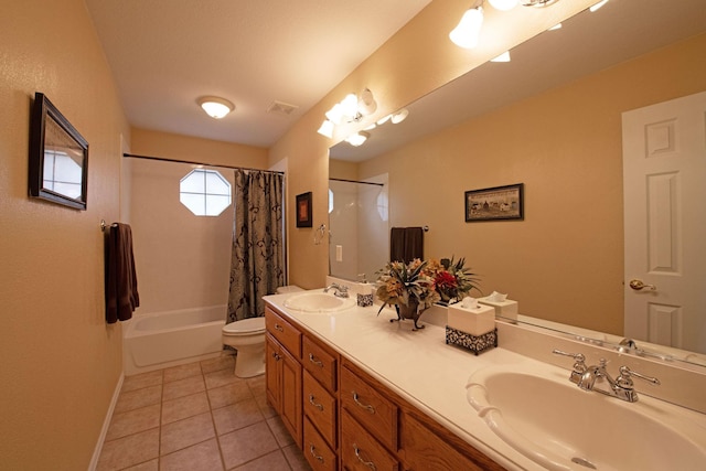 full bathroom with tile patterned floors, toilet, vanity, and shower / bath combo