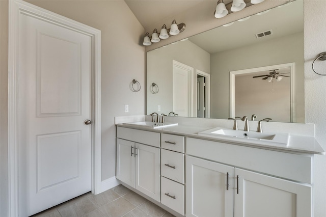 bathroom featuring ceiling fan, tile patterned floors, and vanity