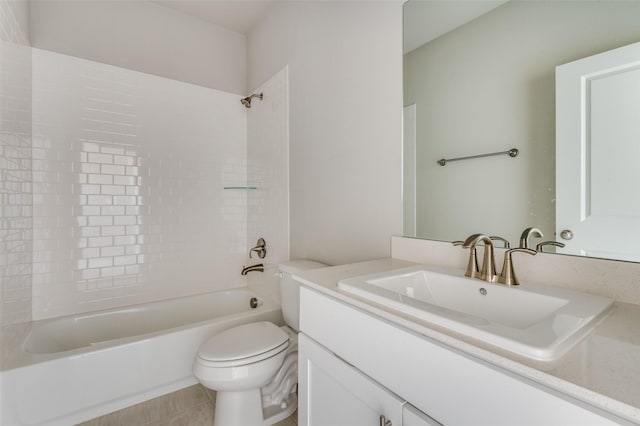 full bathroom with vanity, tile patterned flooring, toilet, and washtub / shower combination