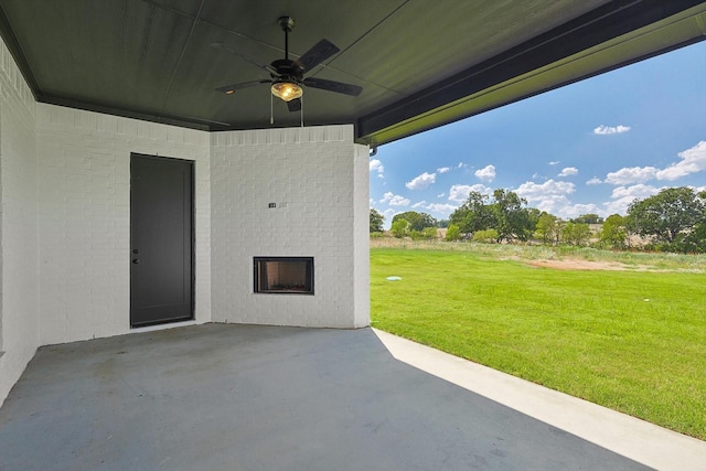 view of patio / terrace featuring ceiling fan