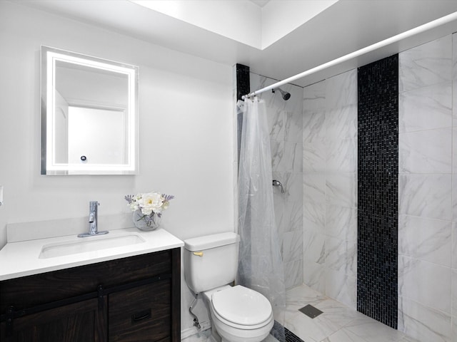 bathroom with vanity, toilet, and walk in shower