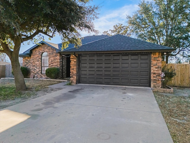 ranch-style home with a garage