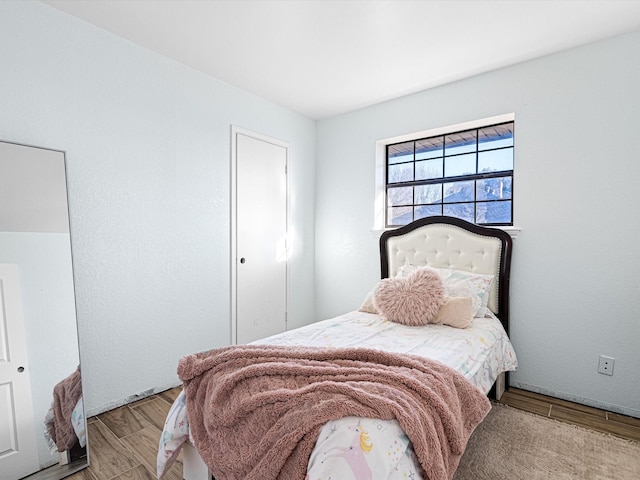 bedroom featuring light hardwood / wood-style flooring