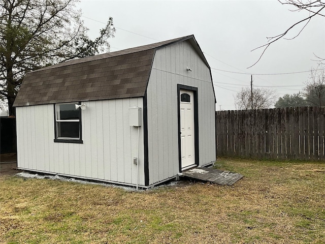 view of outdoor structure with a yard