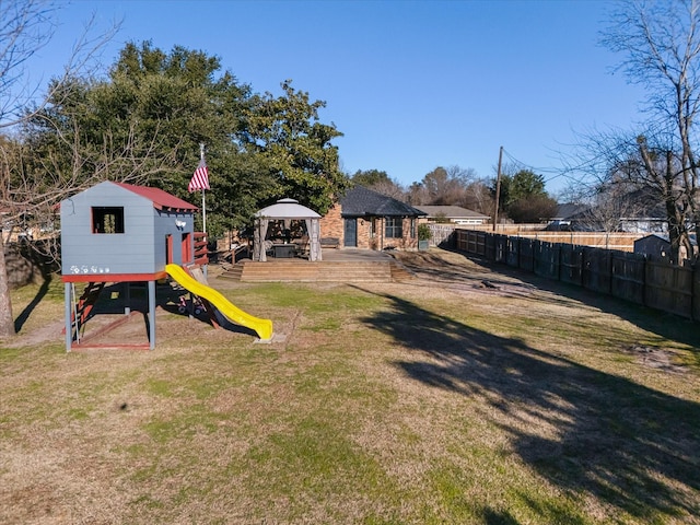 view of yard featuring a playground and a gazebo