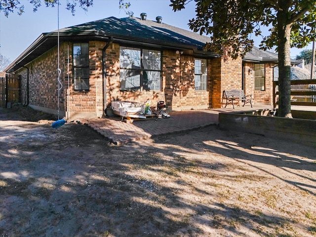 view of front of property featuring a patio area