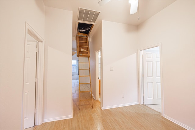 hall with light hardwood / wood-style floors