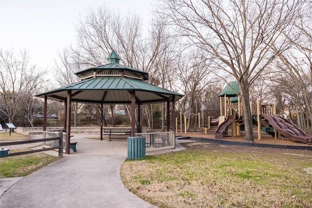 view of community with a yard, a playground, and a gazebo