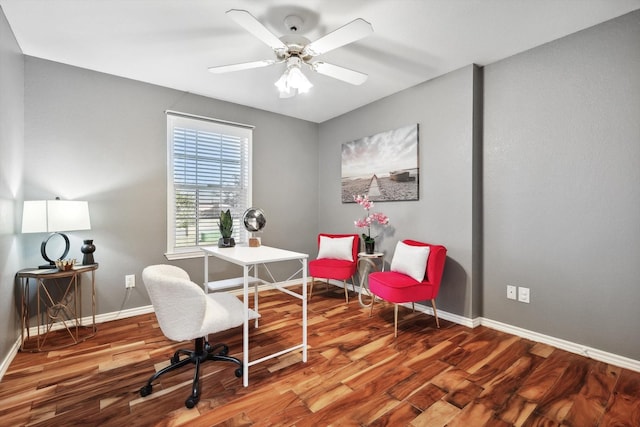 home office featuring baseboards, wood finished floors, and a ceiling fan