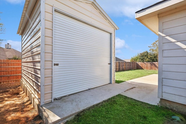 garage featuring fence