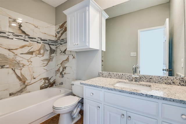 full bathroom featuring vanity, tiled shower / bath combo, a textured ceiling, and toilet