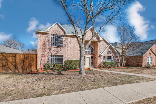 front facade with a front lawn