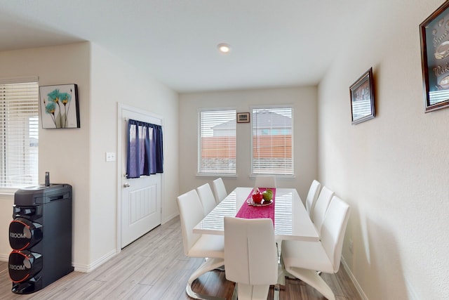 dining room with light wood-type flooring