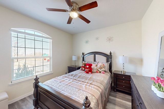 bedroom featuring ceiling fan and light wood-type flooring