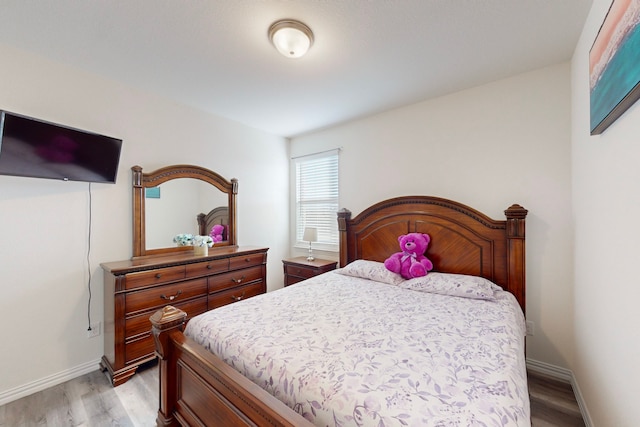 bedroom featuring light hardwood / wood-style flooring