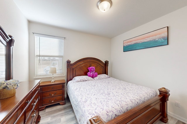 bedroom featuring light wood-type flooring