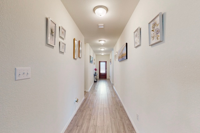 hall featuring light hardwood / wood-style floors