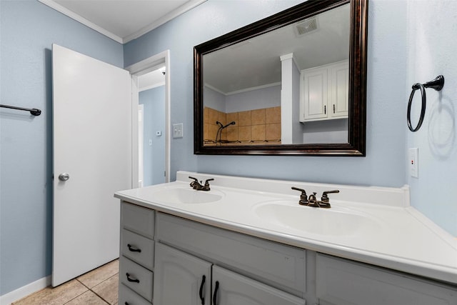 bathroom featuring vanity, ornamental molding, and tile patterned floors