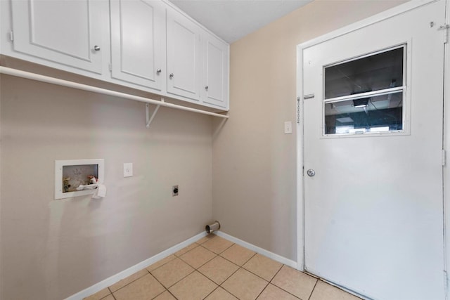 laundry room featuring light tile patterned floors, hookup for a washing machine, cabinets, and hookup for an electric dryer