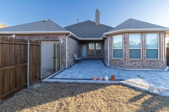 rear view of property with a patio area