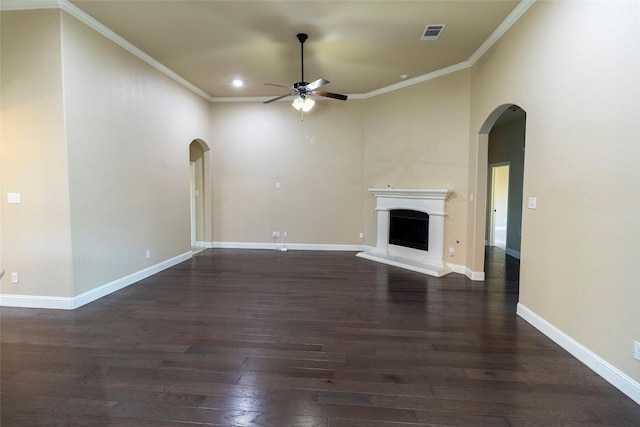 unfurnished living room with crown molding, dark hardwood / wood-style floors, and ceiling fan