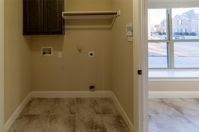 clothes washing area with light tile patterned floors, cabinets, washer hookup, hookup for a gas dryer, and hookup for an electric dryer