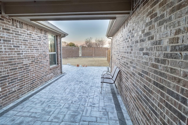 view of patio terrace at dusk