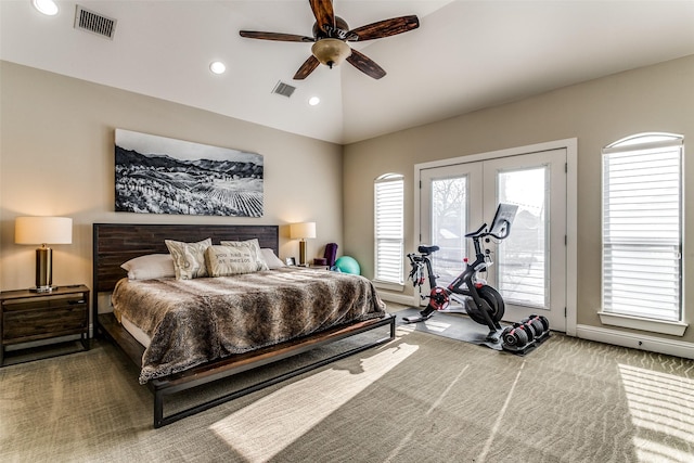 carpeted bedroom featuring lofted ceiling, ceiling fan, and french doors