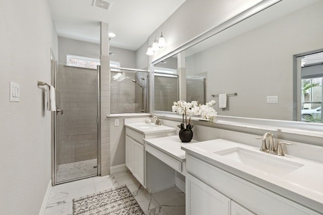 bathroom featuring vanity and an enclosed shower