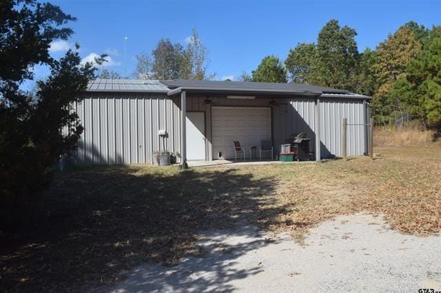 view of outdoor structure featuring a garage