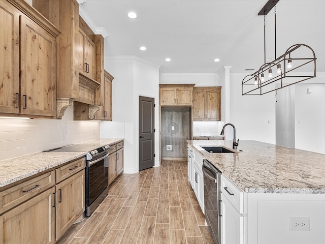 kitchen with sink, crown molding, appliances with stainless steel finishes, pendant lighting, and light stone countertops