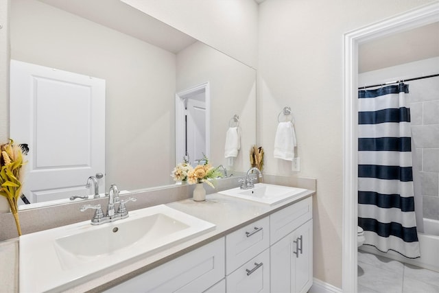 full bathroom with shower / tub combo with curtain, a sink, toilet, and double vanity