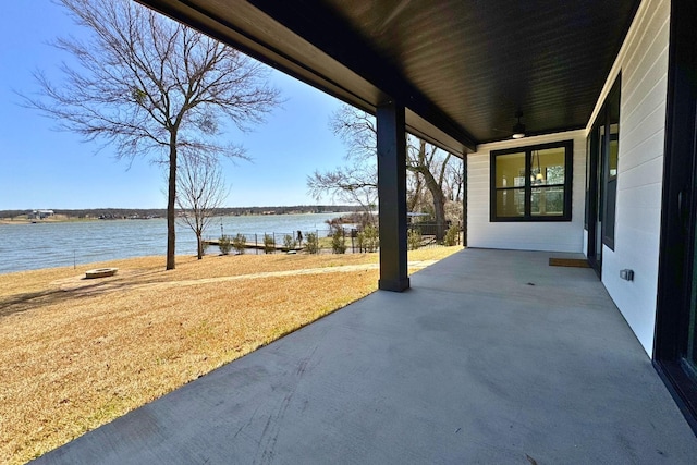 view of patio / terrace featuring a water view