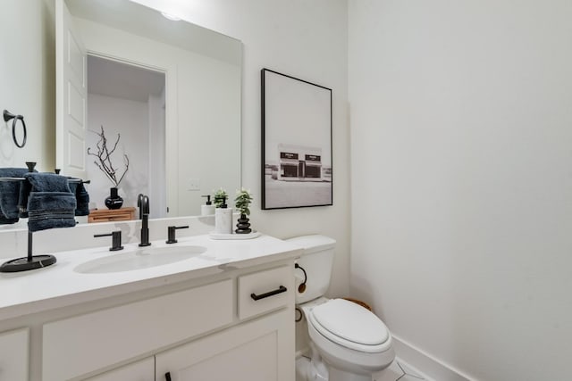 13590 Park Harbor Dr, Eustace, TX 75124 - half bath featuring toilet, vanity, and baseboards