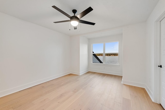 13590 Park Harbor Dr, Eustace, TX 75124 - unfurnished room featuring light wood finished floors, baseboards, and ceiling fan