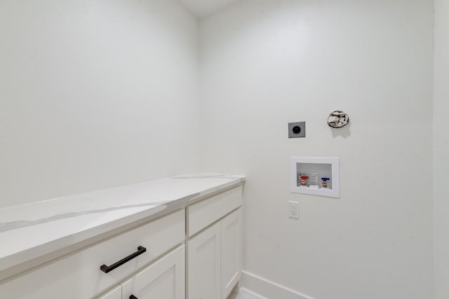 13590 Park Harbor Dr, Eustace, TX 75124 - washroom with electric dryer hookup, washer hookup, baseboards, and cabinet space