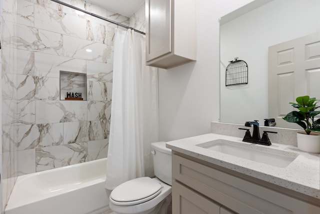 full bathroom with vanity, toilet, and shower / tub combo with curtain