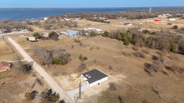 bird's eye view with a water view and a rural view