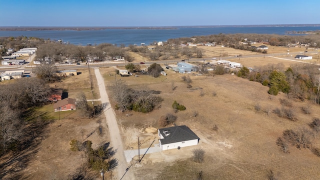 bird's eye view with a rural view and a water view