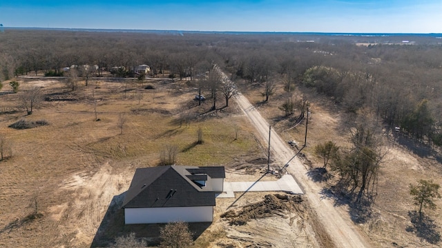 birds eye view of property featuring a rural view