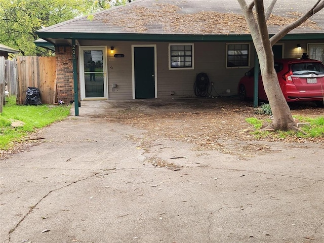 view of front of house featuring a carport