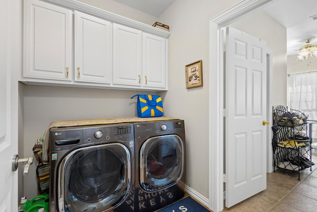 laundry room featuring ceiling fan, cabinets, tile patterned floors, and washer and dryer