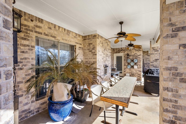 view of patio with ceiling fan