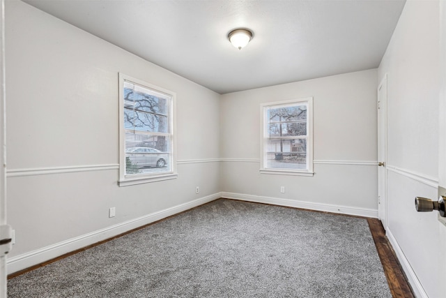 2325 Halbert St, Fort Worth, TX 76112 - unfurnished room with baseboards and dark wood finished floors
