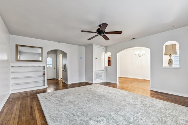 spare room featuring dark hardwood / wood-style floors and ceiling fan