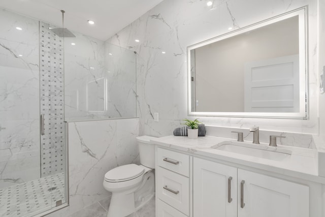 bathroom featuring vanity, toilet, tile walls, and walk in shower